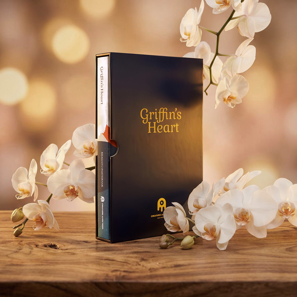 Hero shot of Griffin's Heart: Mourning Your Pet With No Apologies in its premium gold-stamped slipcase, a luxury keepsake pet memorial gift for grieving pet owners (cat/dog). SKU: GH001.